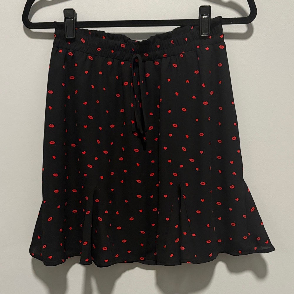 Stylish Black Mini Skirt with Red Lip Print